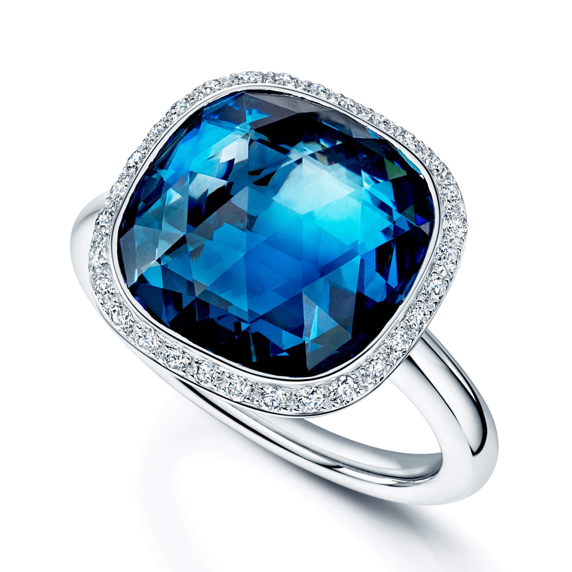 18ct White Gold London Blue Topaz Fancy Ring With A Round Brilliant Cut Halo Surround