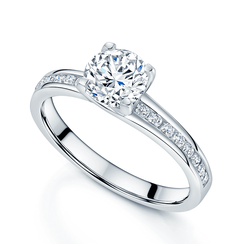 Platinum GIA Certificated 1.06 Carat Round Brilliant Cut Solitaire Diamond Ring With Diamond Channel Set Shoulders