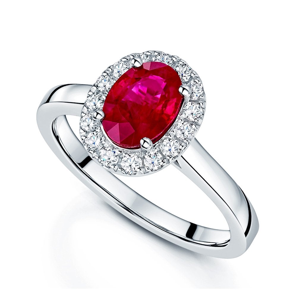 Platinum Oval Cut Ruby And Diamond Halo Ring