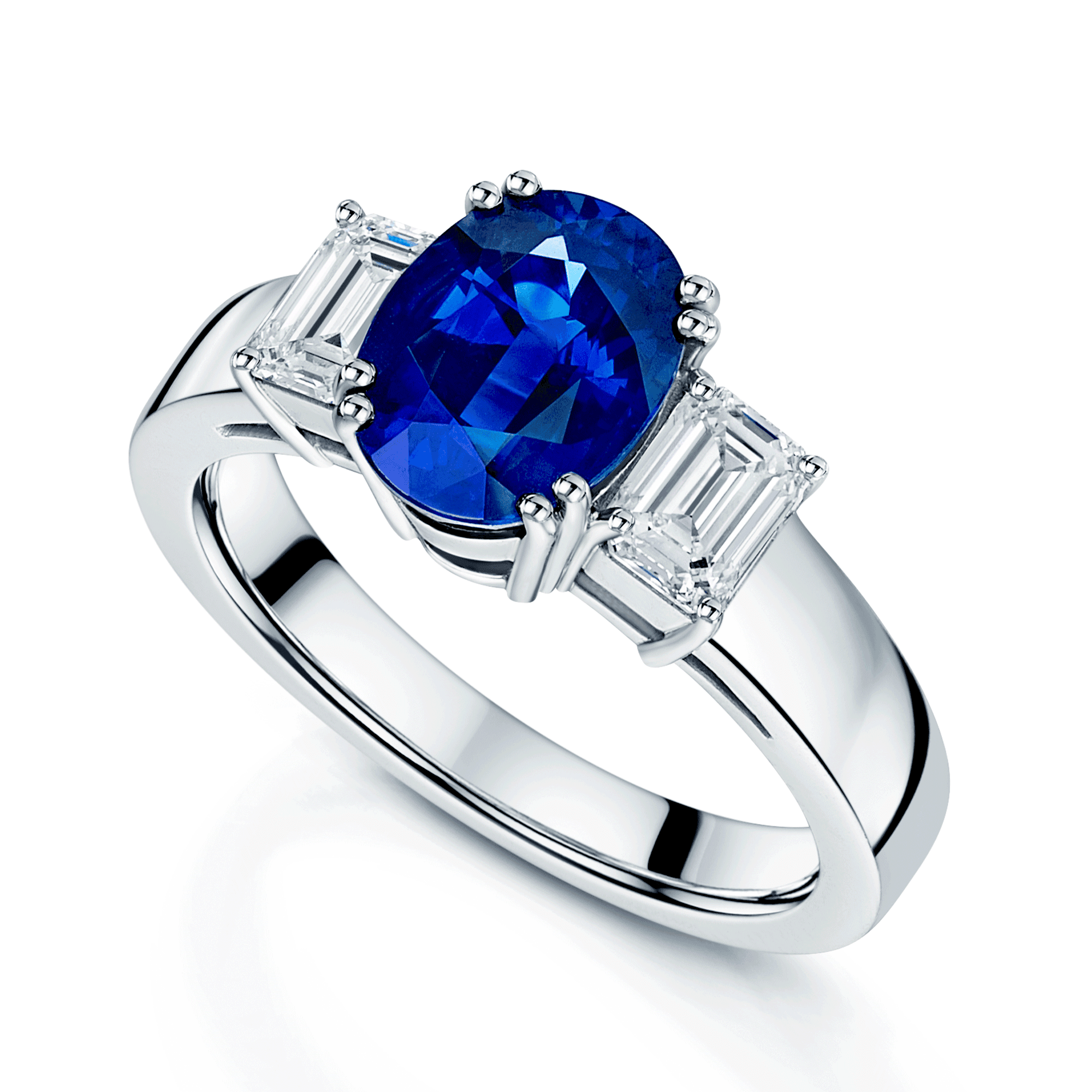 Platinum Oval Sapphire & Emerald Cut Diamond Three Stone Ring