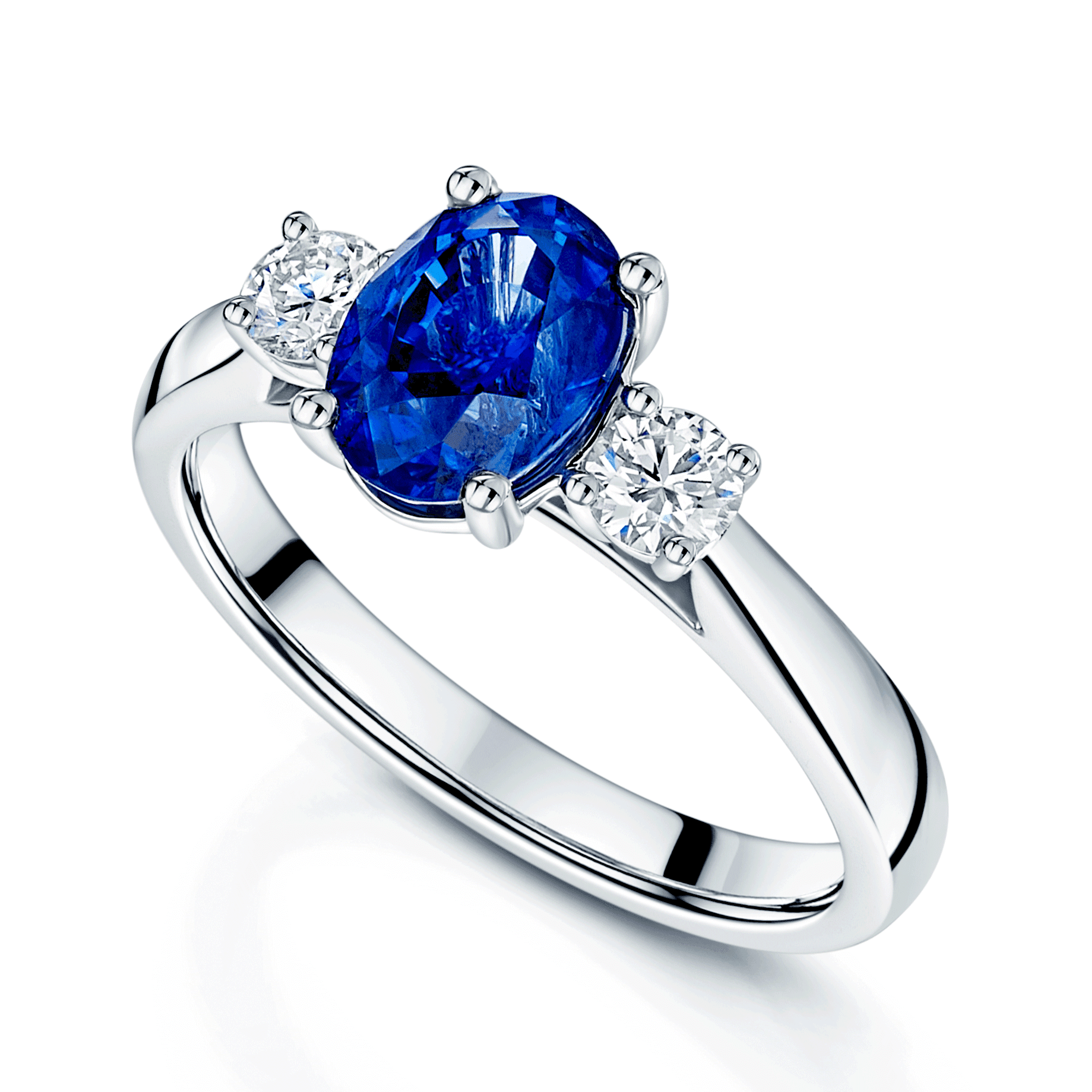 Platinum Oval Blue Sapphire & Round Brilliant Cut Diamond Three Stone Ring