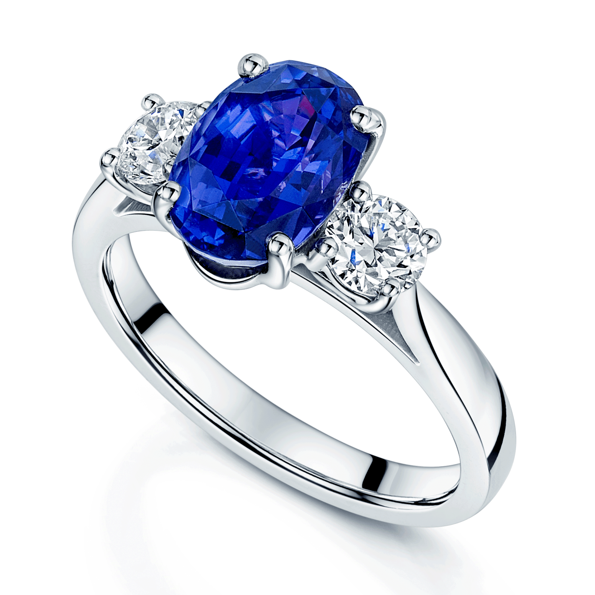 Platinum Oval Cut Purple Sapphire & Round Brilliant Cut Diamond Three Stone Ring