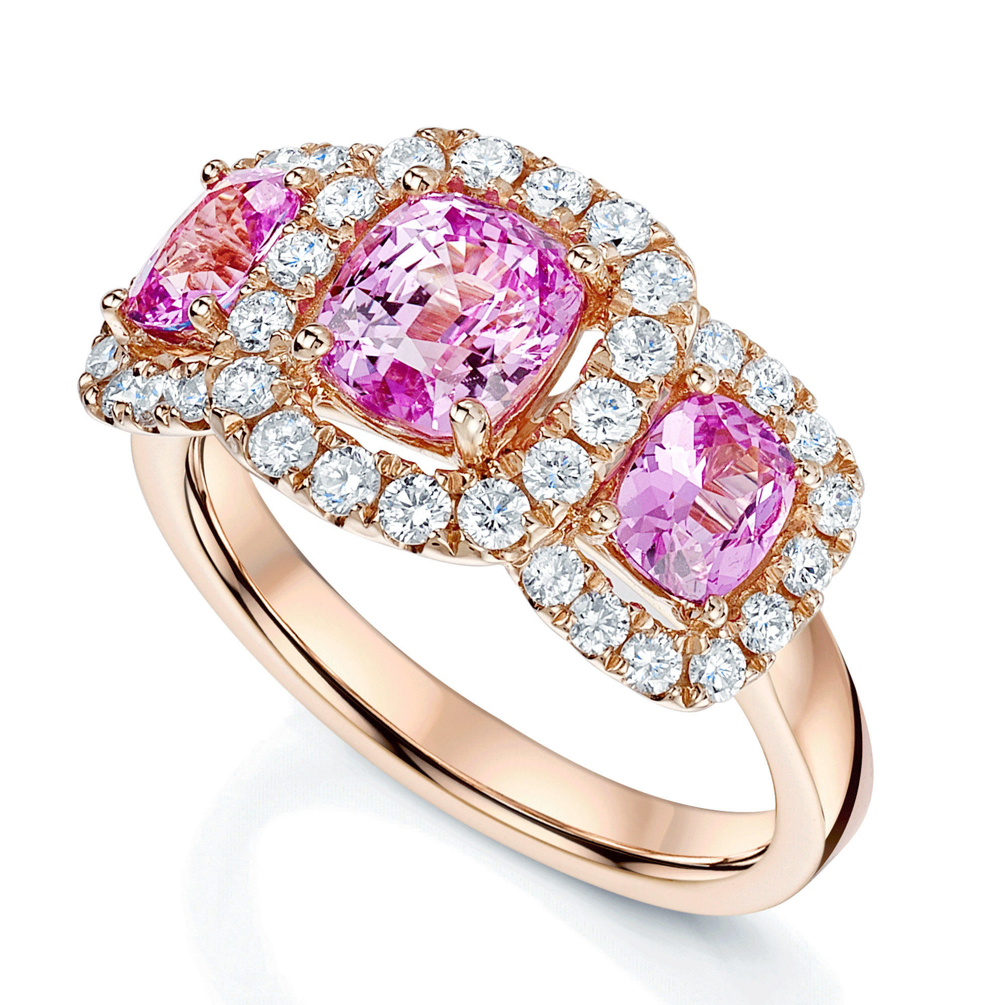 18ct Rose Gold Cushion Cut Pink Sapphire Three Stone Ring In A Diamond Halo Setting